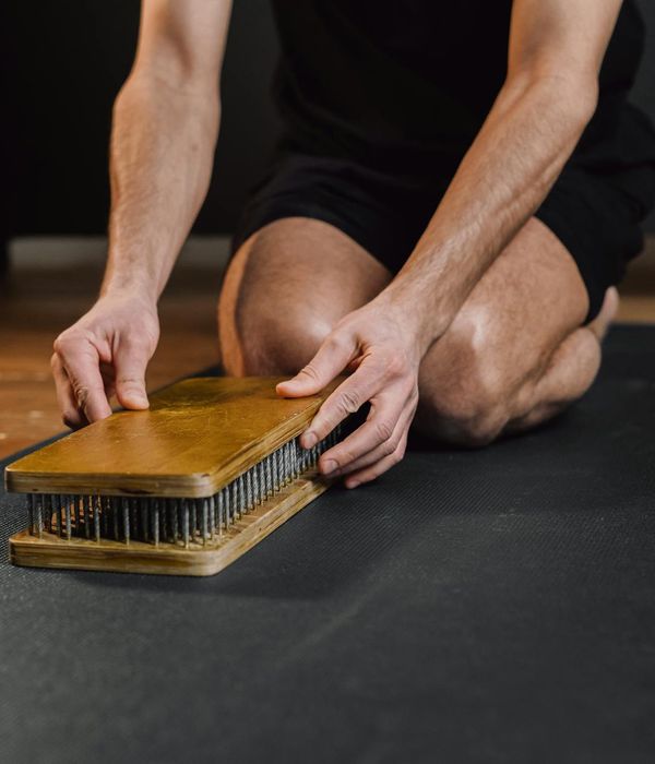 Man in a state of calm focus during a workout, demonstrating mind-body connection.